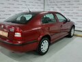 2010 Skoda Octavia I (A4) Рестайлинг, красный - вид 7