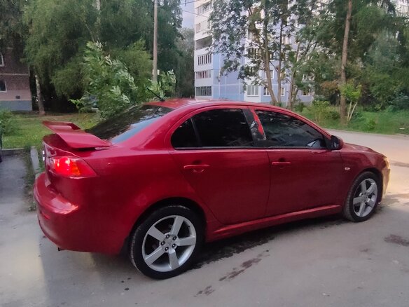 2007 Mitsubishi Lancer X, красный, 660000 рублей - вид 2