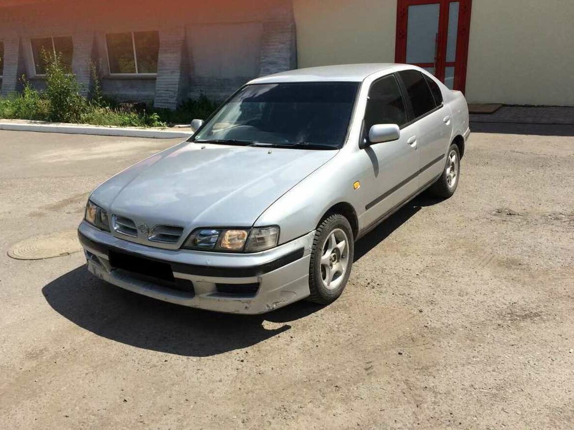 Ниссан старого образца фото