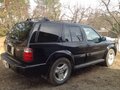 2002 Infiniti QX4 I, чёрный - вид 2