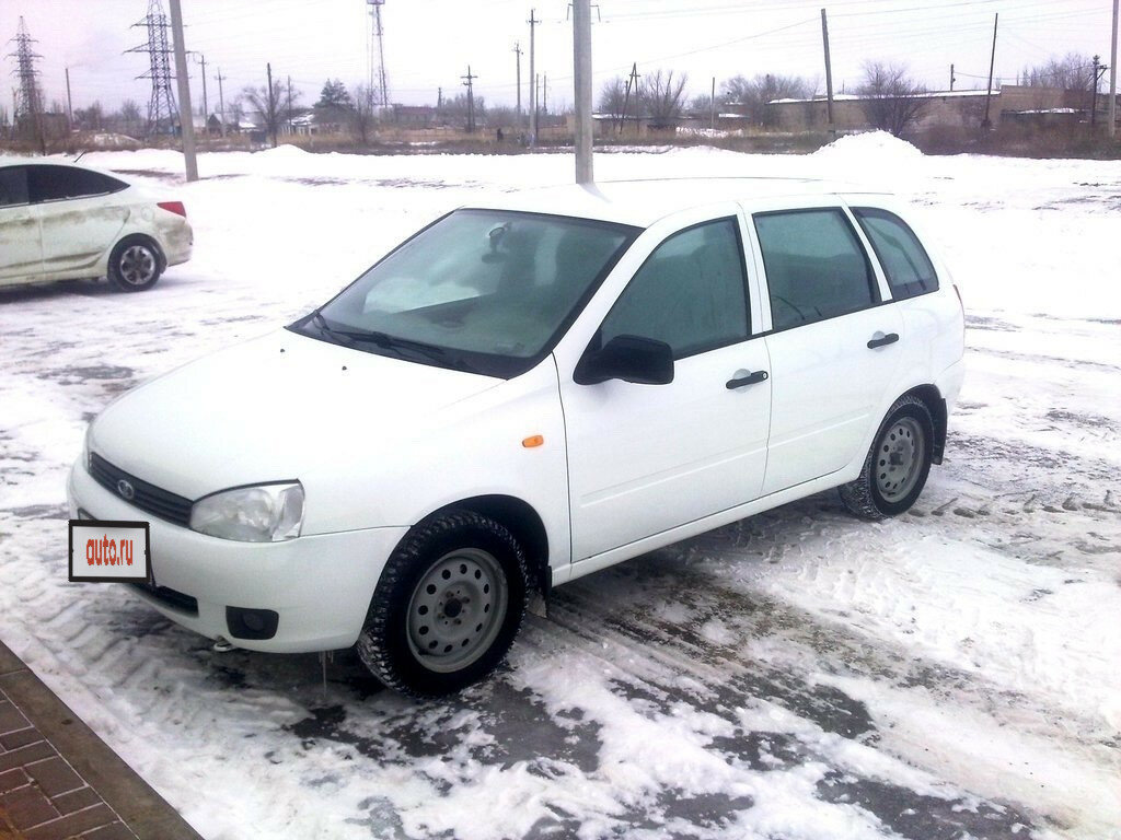 Лада Калина белый седан 2009