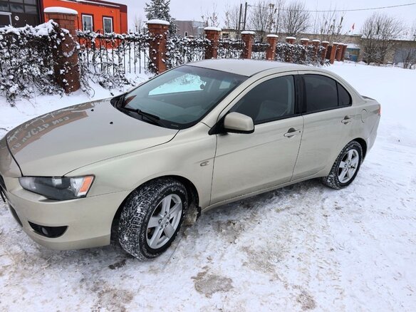 2007 Mitsubishi Lancer X, золотистый, 720000 рублей - вид 1