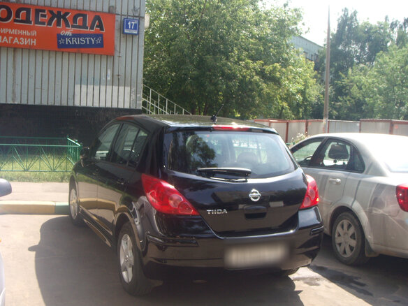 2010 Nissan Tiida I, чёрный - вид 1