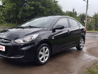 2012 Hyundai Solaris I, чёрный, 690000 рублей, вид 1
