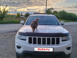 2014 Jeep Grand Cherokee IV (WK2) Рестайлинг, белый, 2400000 рублей, вид 1