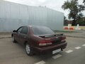 1998 Nissan Maxima IV (A32), красный - вид 1