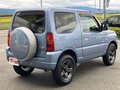 2010 Suzuki Jimny Kei car III Рестайлинг 1, голубой - вид 4