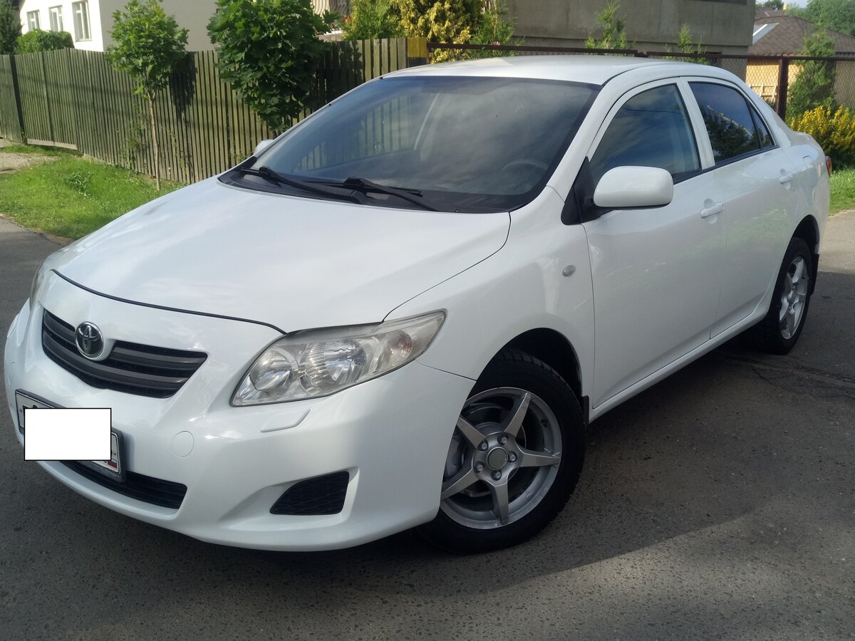 Тойота Королла e150 белый