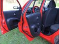 2010 Nissan Micra III (K12), красный - вид 7