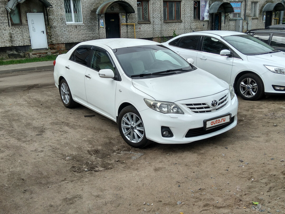 Тойота Королла e150 белый