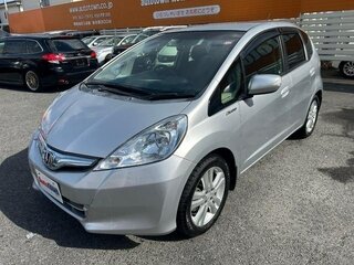 2012 Honda Fit Hybrid II, серебристый, 690000 рублей, вид 1
