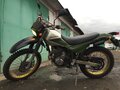 1997 Kawasaki KL 250, зелёный - вид 1