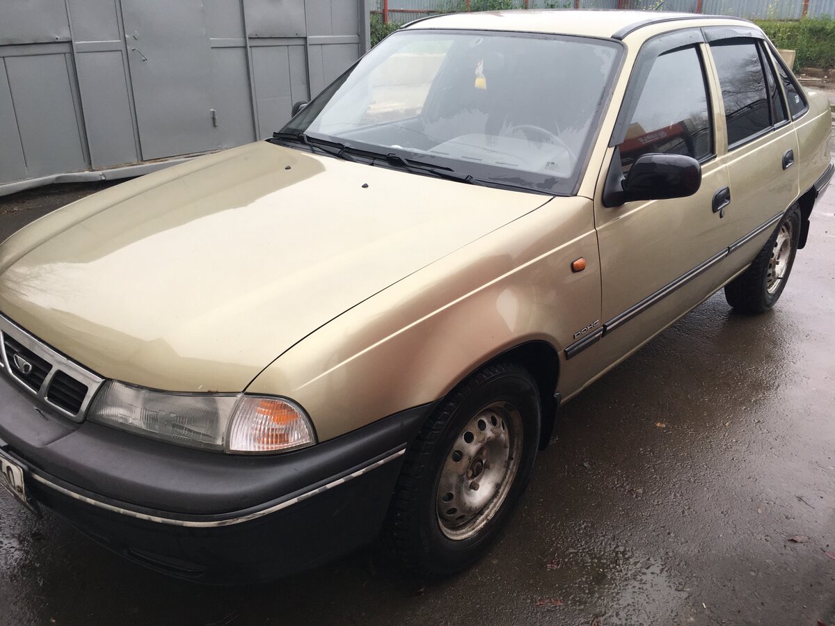 Daewoo Nexia цвет золотистый