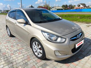 2012 Hyundai Solaris I, бежевый, 780000 рублей, вид 1