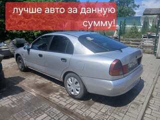 1997 Mitsubishi Carisma I, серебристый, 140000 рублей, вид 1