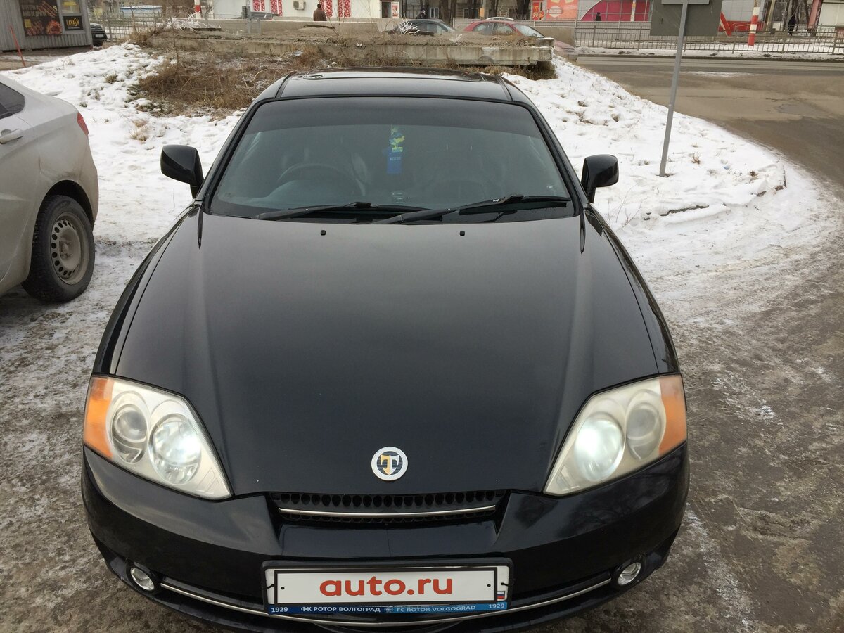 Купить б/у Hyundai Coupe II (GK) 2.0 AT (143 л.с.) бензин