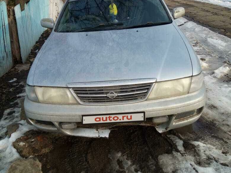Серый ниссан санни
