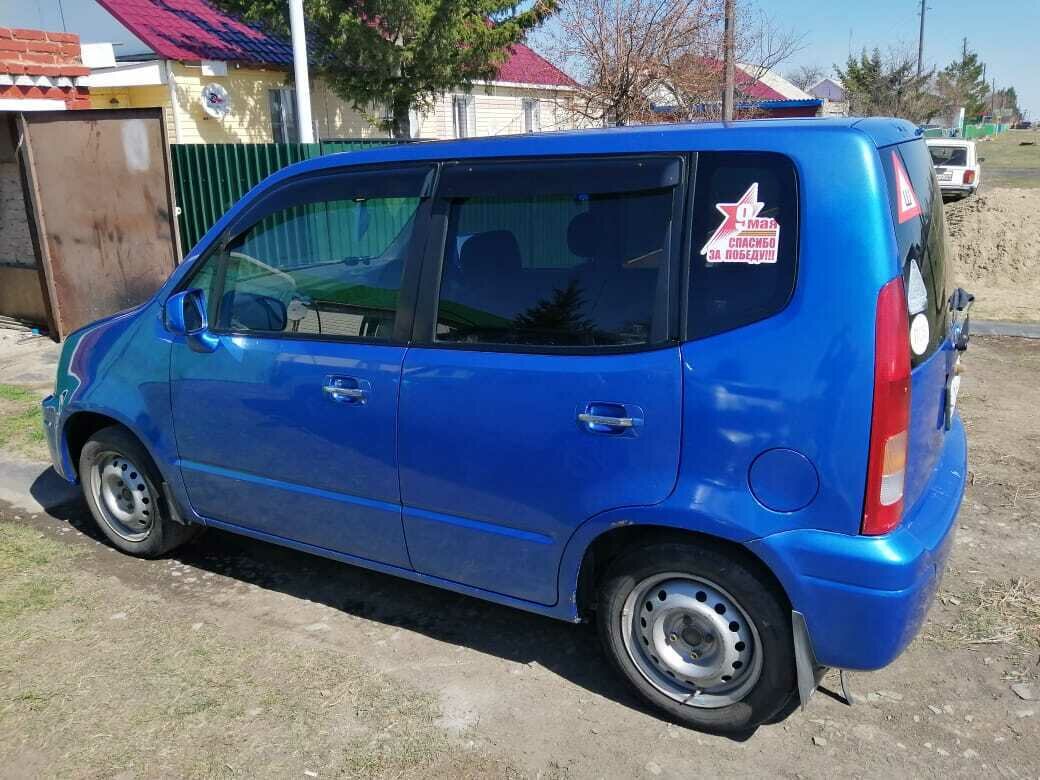 Машина Honda capa