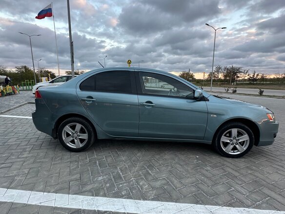 2007 Mitsubishi Lancer X, серый, 660000 рублей - вид 3