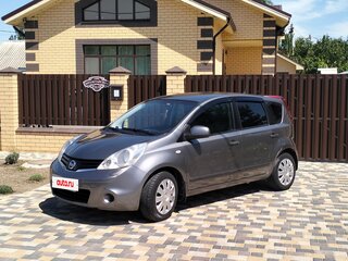 2011 Nissan Note I Рестайлинг, серый, 670000 рублей, вид 1