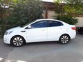2015 Kia Rio 6-speed III, белый - вид 1