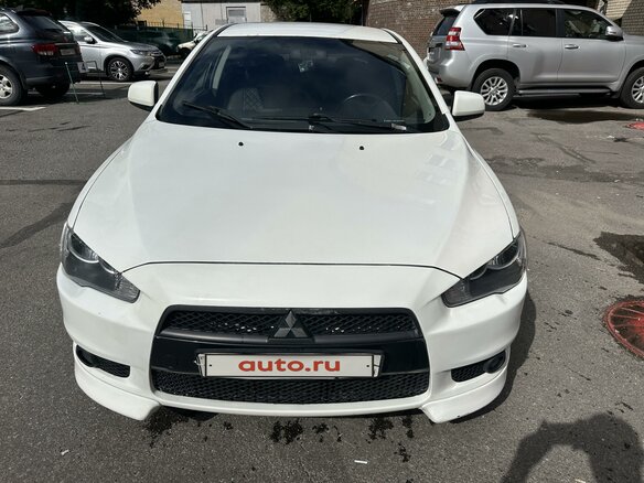 2007 Mitsubishi Lancer X, белый, 690000 рублей - вид 1