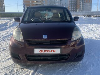 2009 Toyota Passo I (C10), коричневый, 520000 рублей, вид 1