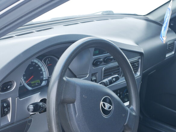2010 Daewoo Nexia I Рестайлинг, серебристый - вид 1