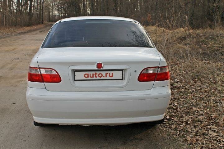 Белый фиат альбеа