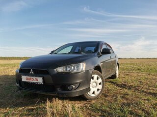 2007 Mitsubishi Lancer X, чёрный, 610000 рублей, вид 1