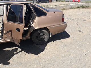 2001 Daewoo Nexia I, бежевый, 70000 рублей, вид 5