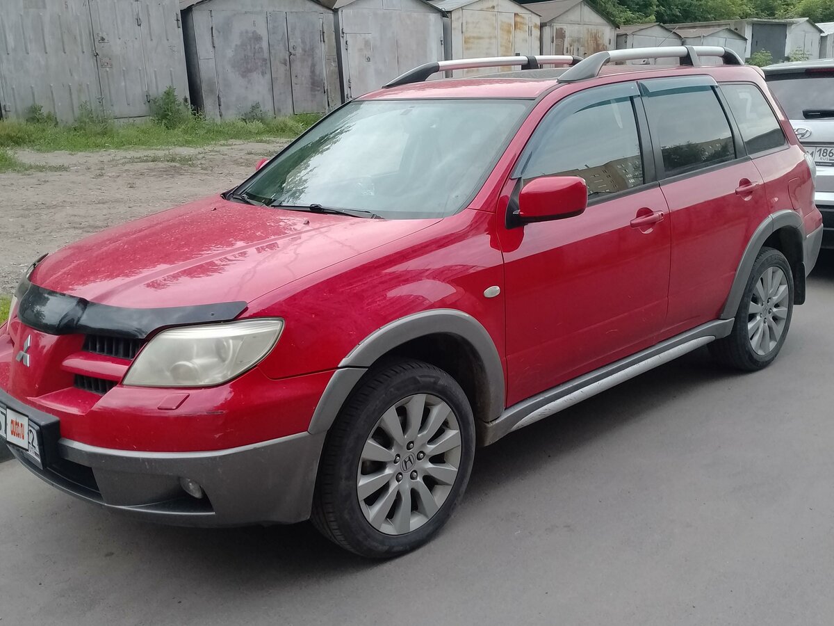 Купить б/у Mitsubishi Outlander I 2.4 AT (160 л.с.) 4WD бензин автомат ...