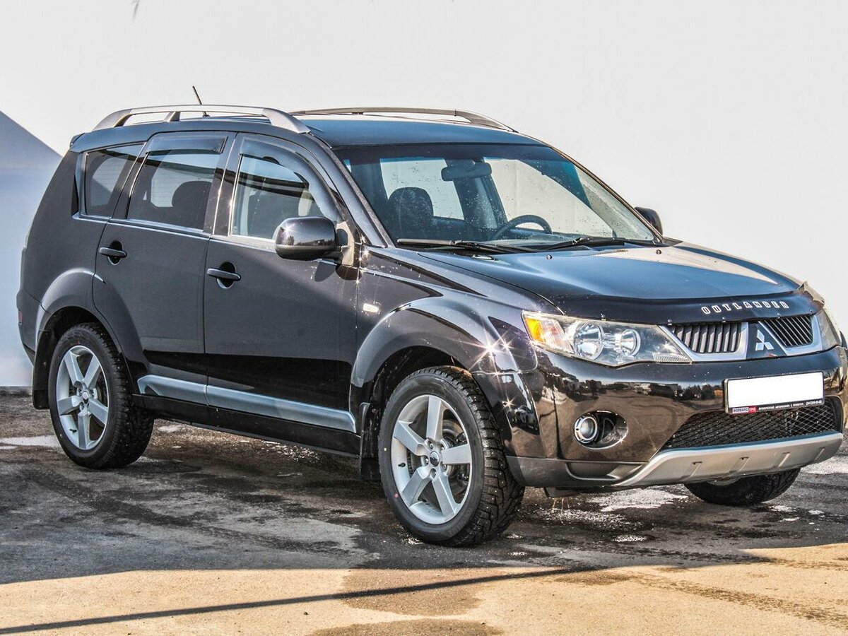 Купить б/у Mitsubishi Outlander II 2.4 MT (170 л.с.) 4WD бензин ...