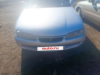 1992 Toyota Sprinter Marino, серый, 450000 рублей, вид 1