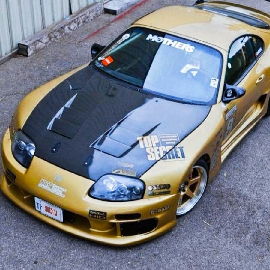 1996 Toyota Supra IV (A80) Рестайлинг, золотистый - вид 1.