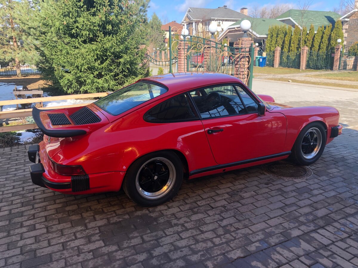 Порше 911 красный кабриолет