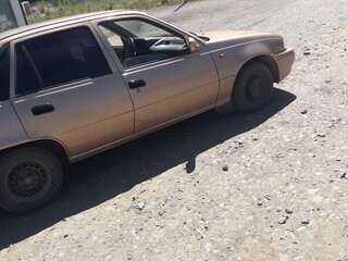 2001 Daewoo Nexia I, бежевый, 70000 рублей, вид 4