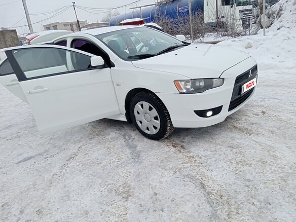 2007 Mitsubishi Lancer X, белый, 700000 рублей - вид 2