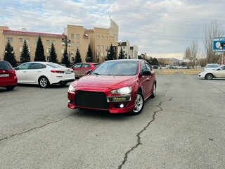 2008 Mitsubishi Lancer X, красный, 679000 рублей, вид 1