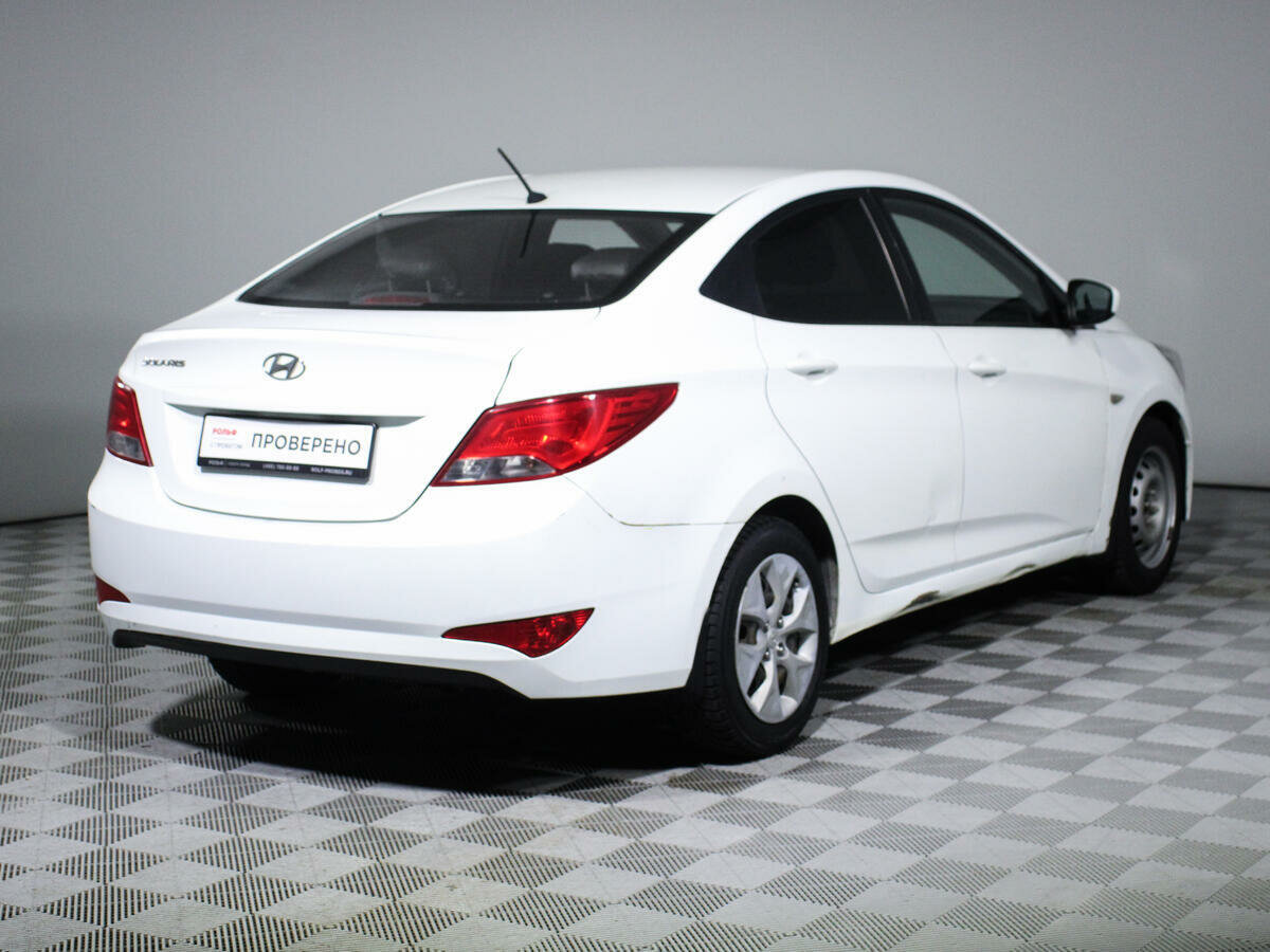 Купить б/у Hyundai Solaris I Рестайлинг 1.6 AT (123 л.с.) бензин автомат в Москв