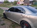2008 Mitsubishi Lancer X, бежевый, 900000 рублей - вид 3