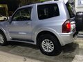 2004 Mitsubishi Pajero III Рестайлинг, серебристый - вид 2