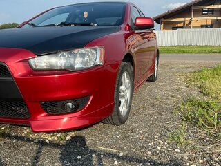 2008 Mitsubishi Lancer X, красный, 720000 рублей, вид 1