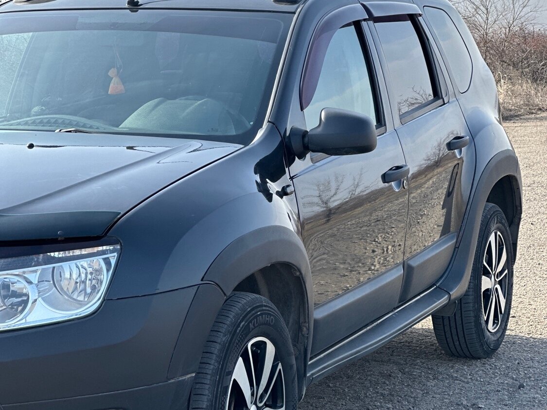 Купить б/у Renault Duster I 1.6 MT (102 л.с.) 4WD бензин механика в Смоленске: к