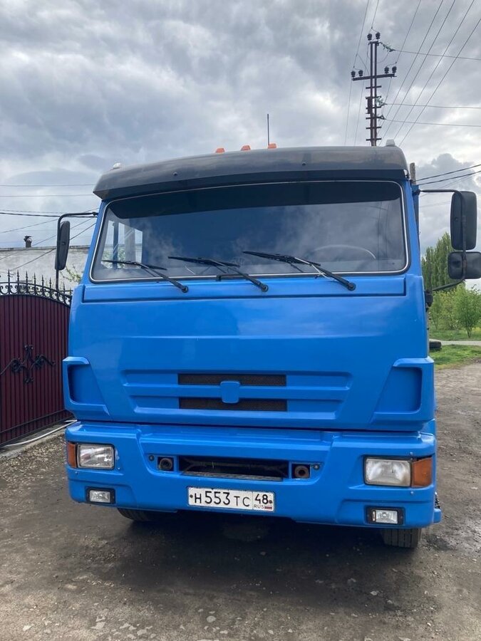 Камаз синий бортовой