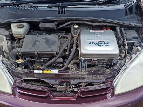 2003 Toyota Prius I Рестайлинг (XW10), красный, 280000 рублей - вид 9