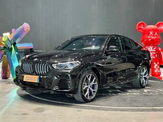 2022 BMW X6 40i III (G06), чёрный, 7034000 рублей, вид 1