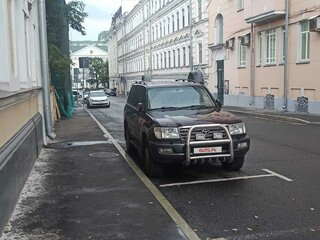 2004 Toyota Land Cruiser 100 Series Рестайлинг 1, пурпурный, 2000000 рублей, вид 1