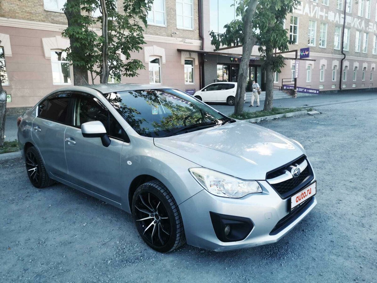 Купить б/у Subaru Impreza IV 1.6 CVT (114 л.с.) 4WD бензин