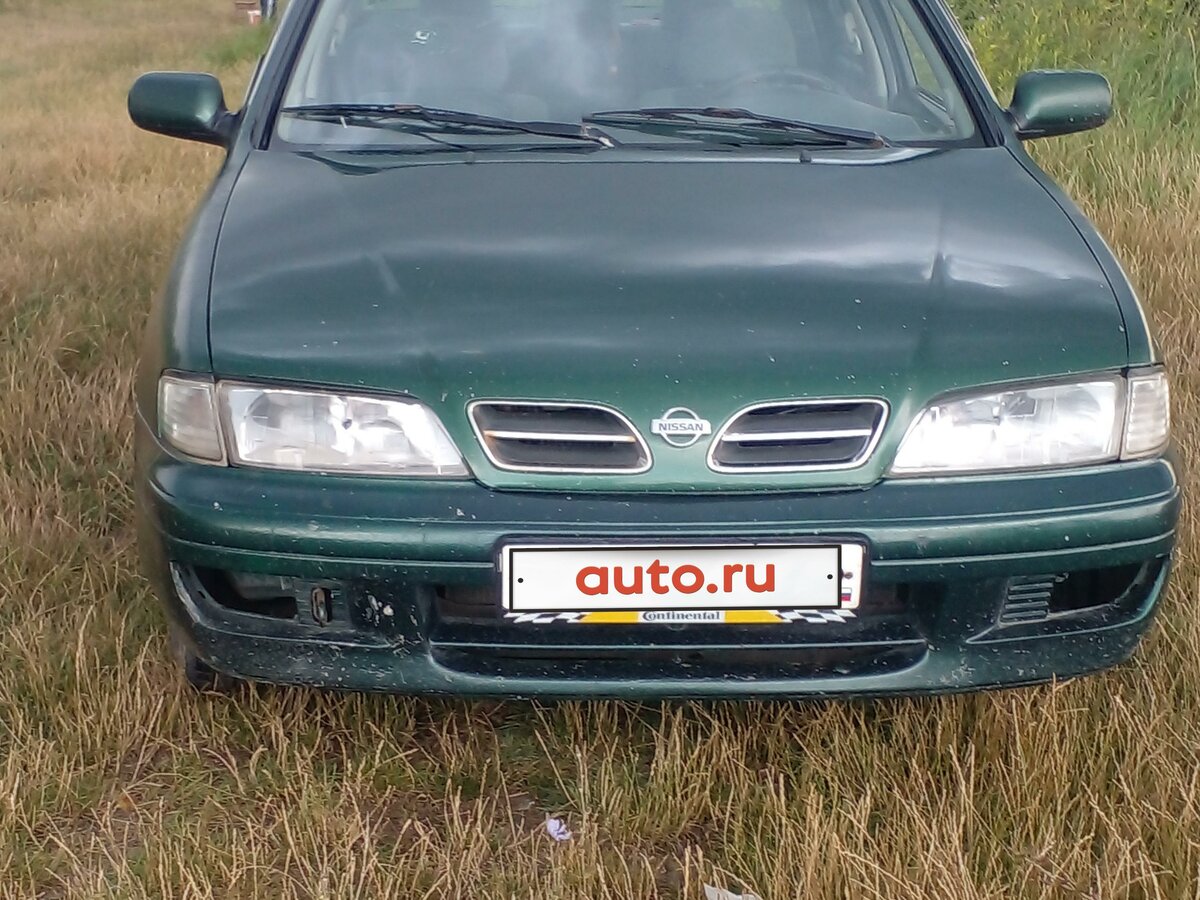 Зеленый ниссан примера